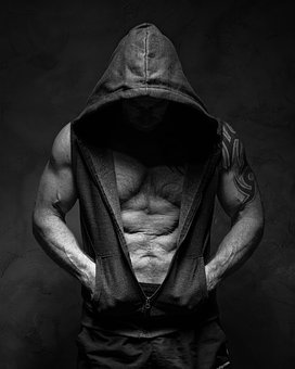 muscular man in hoody