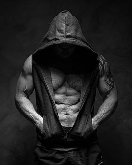 Muscular man in hoody