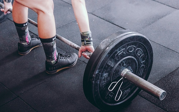 Man lifting barbell