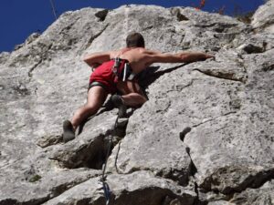 man rock climbing